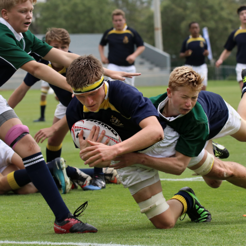 athletes playing rugby